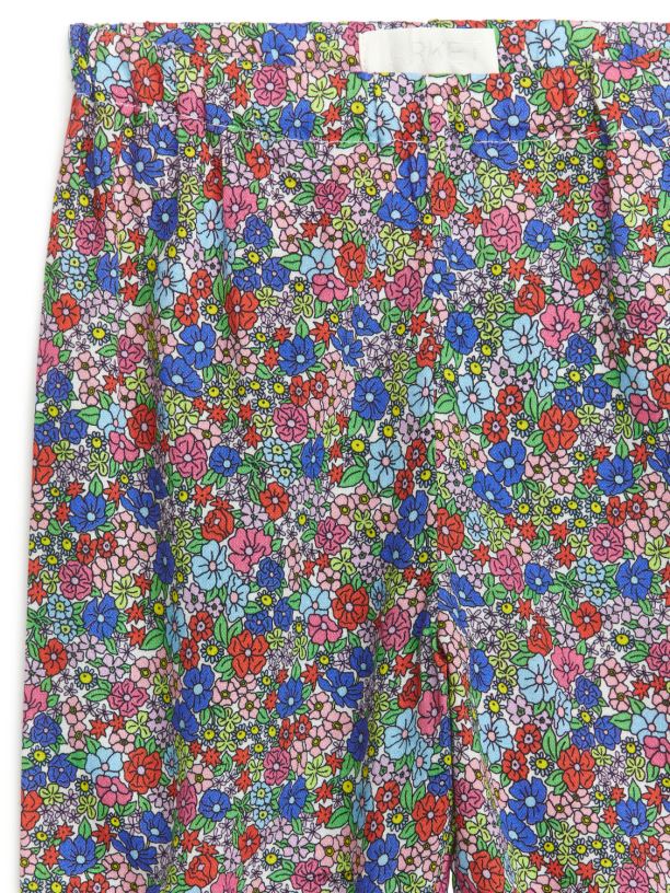 děti ARKET celoplošné kalhoty s potiskem oblečení modrá/květinová J8R2D1732